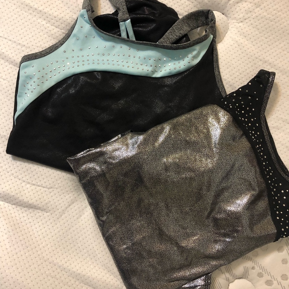 Two girls justice leotards